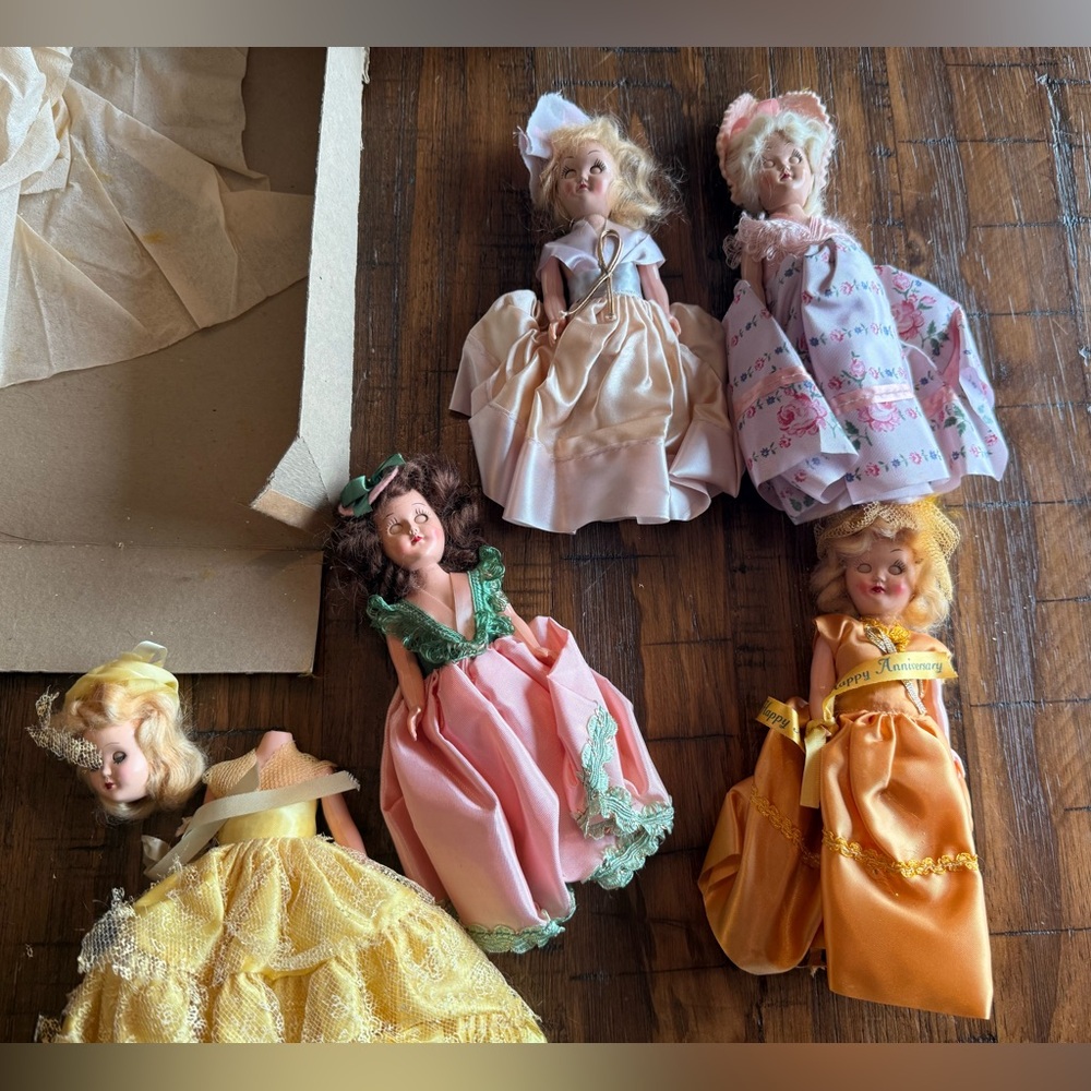 Elegant Doll Set with Colorful Dresses